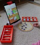 Osmo Pizza Co. is a fun and moderately engaging game for children aged 5 and up. Your child will learn to interpret customers based on expressions and sounds, practice arithmetic, and gain a basic understanding of economics. However, even a three-year-old can make pizza without significant demands being placed upon them.