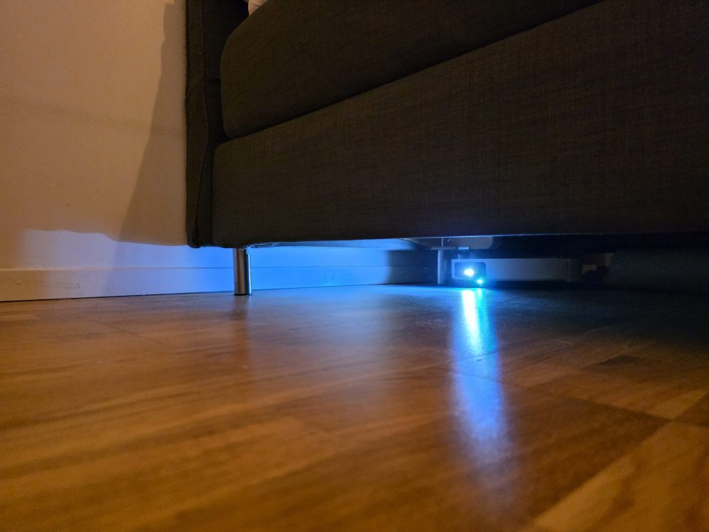 The X60 Ultra vacuuming under the bed