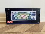 The Trust GXT872 Xyra TKL is an affordable mechanical keyboard with a distinct retro design, hot-swappable switches, and flexible RGB lighting that is well-suited for both gaming and typing. The soft and dampened typing feel is comfortable during extended use, but the high profile may require some getting used to.